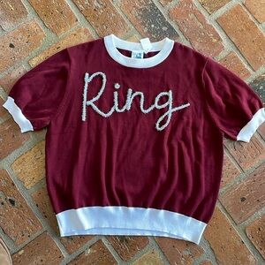 Queen of Sparkles maroon “Ring” short sleeve sweater